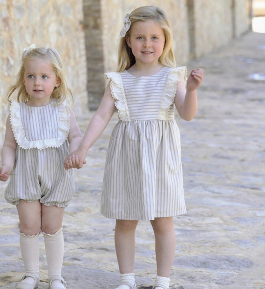 Abito beige con fiocco rapife