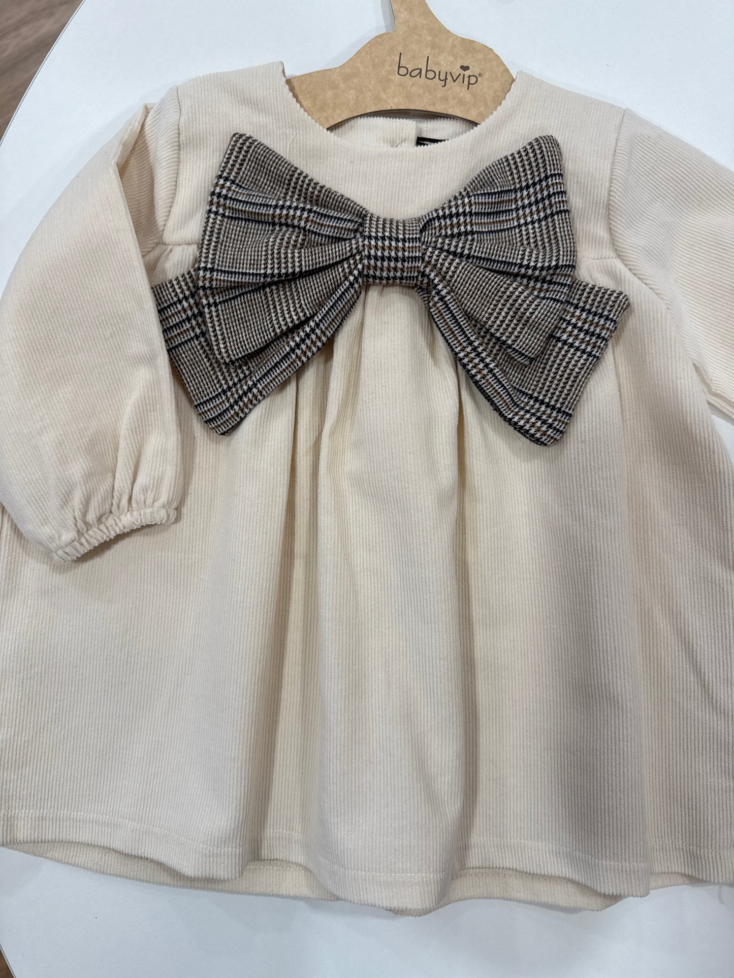 Abito beige fiocco