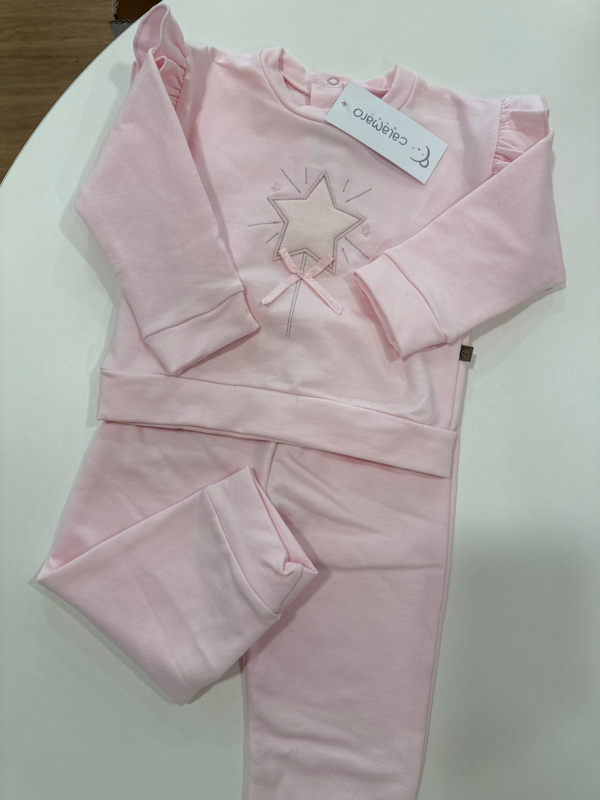Tuta rosa bimba