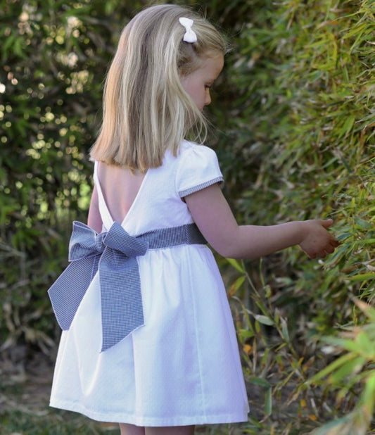 Abito bianco con fiocco rapife